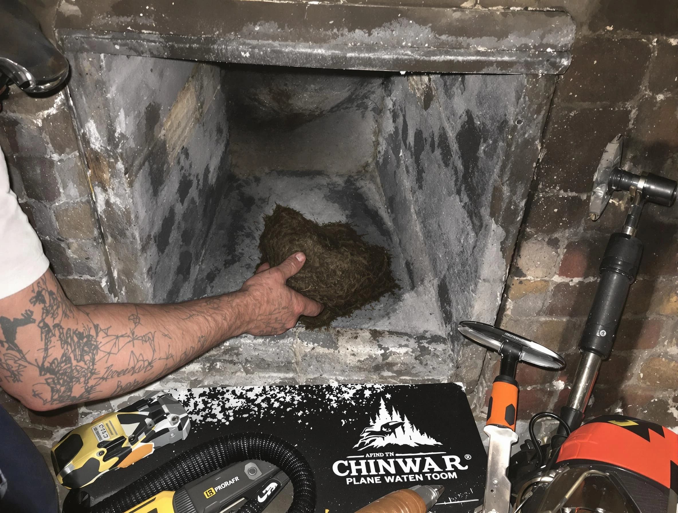 Englewood Chimney Sweep safely removing debris and screening chimney in Englewood, CO